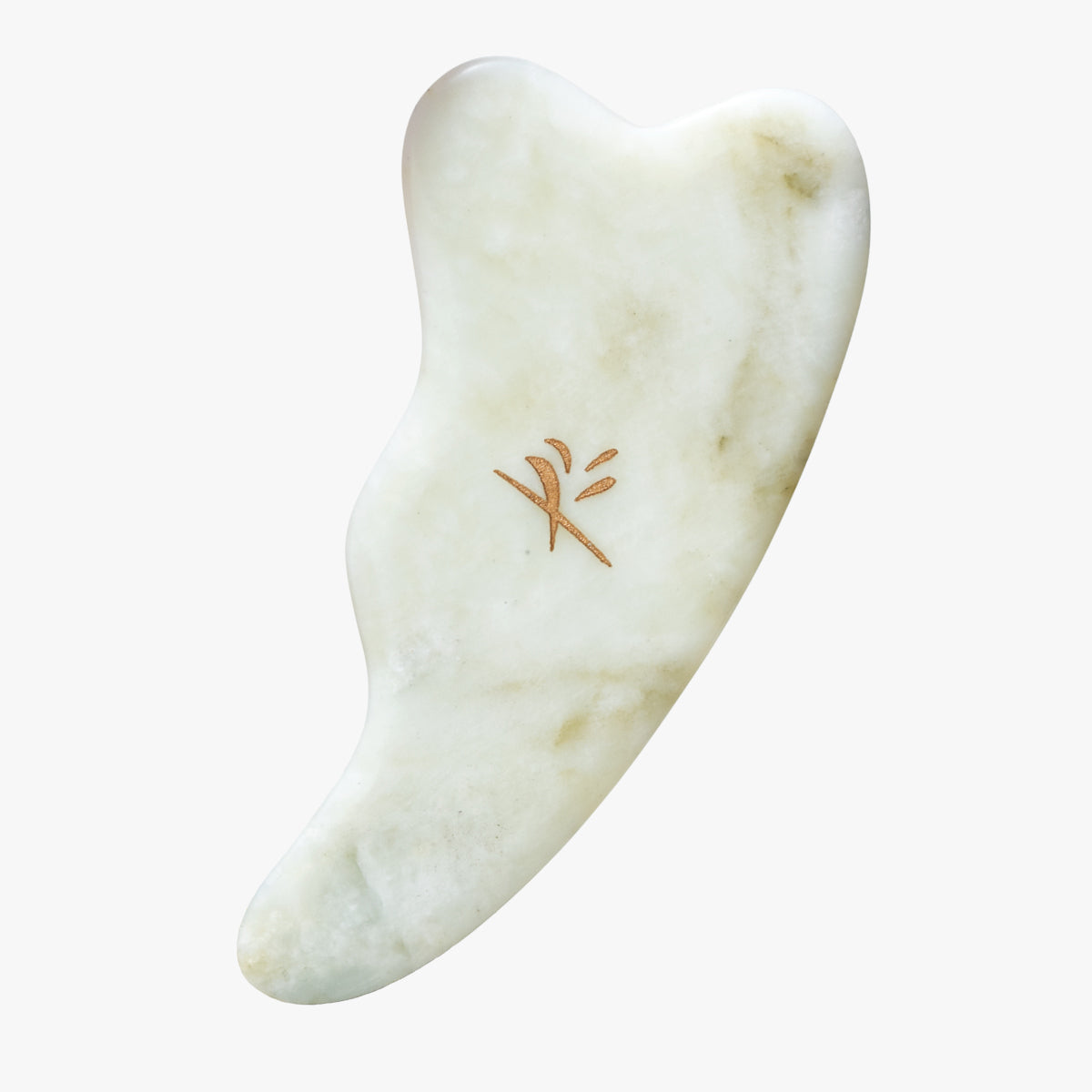 White stone tool with a gold design on a white background
