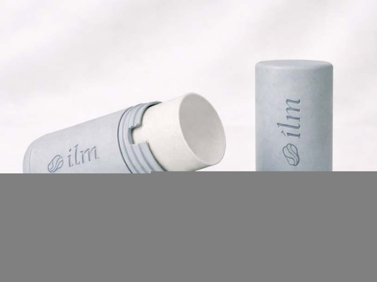 The refillable casing opened, showing the kraft paper inner refill